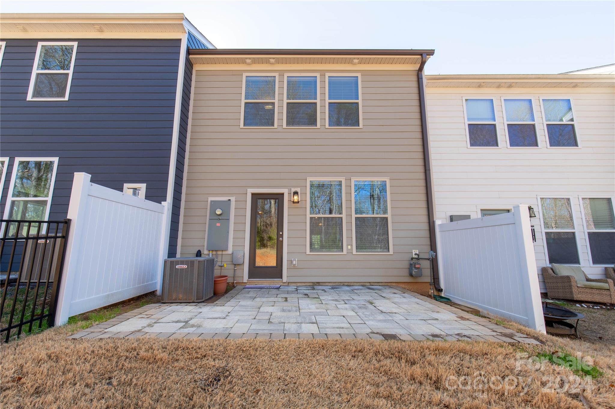 2026 Sutton View Road, Unit 693 Fort Mill, SC 29708 - Photo 26 of 26 a view of a house with a backyard
