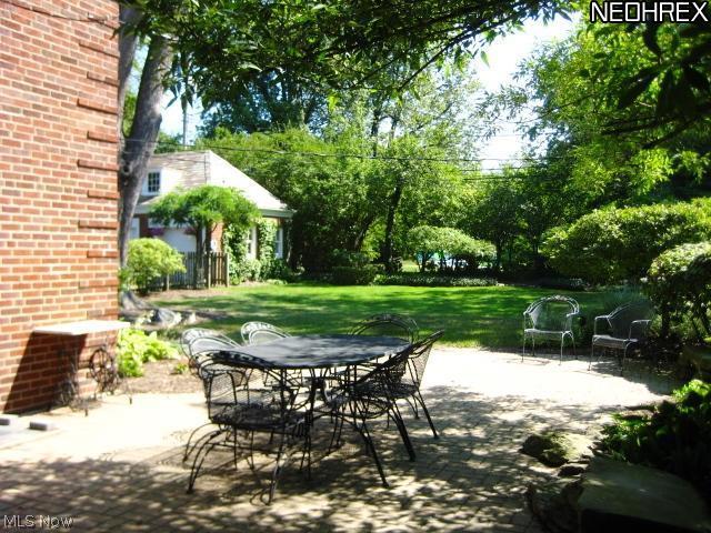 2989 Glengary Road Cleveland, OH 44120 - Photo 22 of 25 PRIVATE PATIO OFF SUN ROOM & WELL MANICURED LAWN & GARDENS