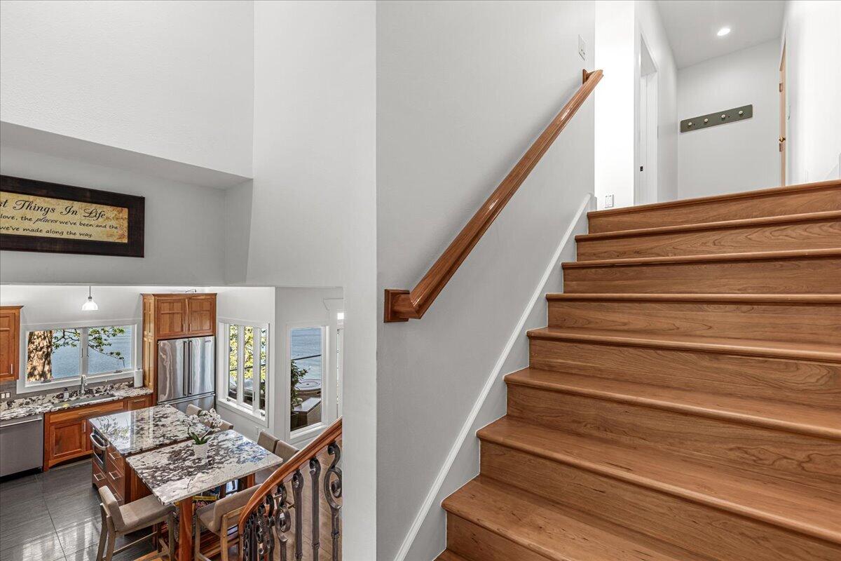 4763 Fontana Beach Road, Unit 4762 Polk, WI 53086 - Photo 36 of 100 Custom Wide Staircase, Cherry Hardwood Floors