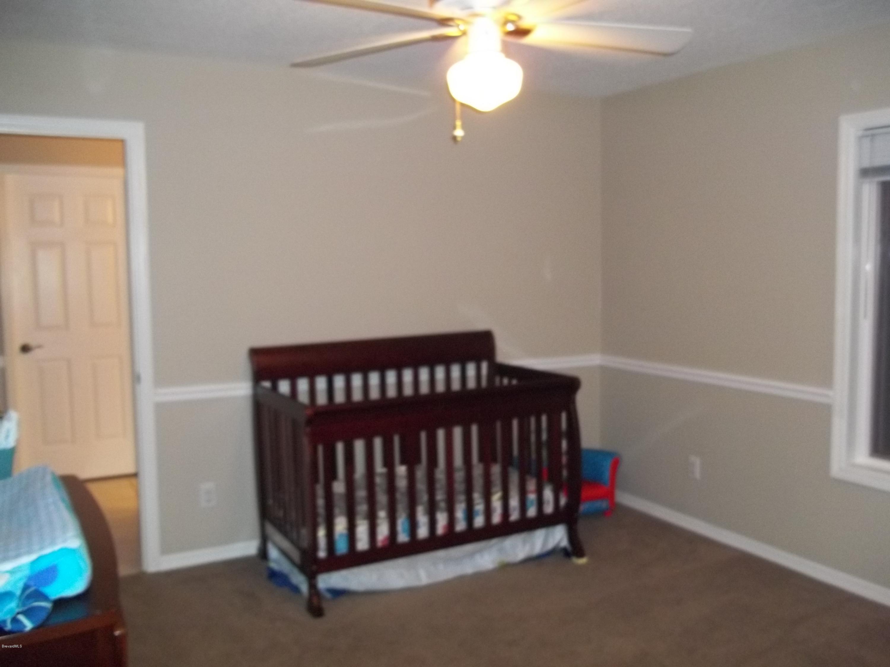 4010 Burkholm Road Mims, FL 32754 - Photo 14 of 48 5th bedroom Nursery / Office