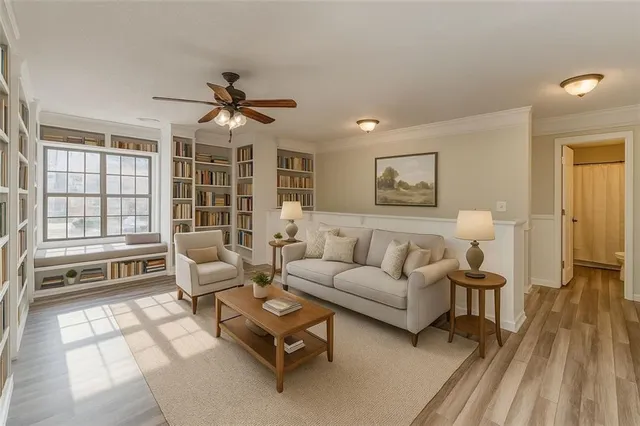 a living room with furniture and a window