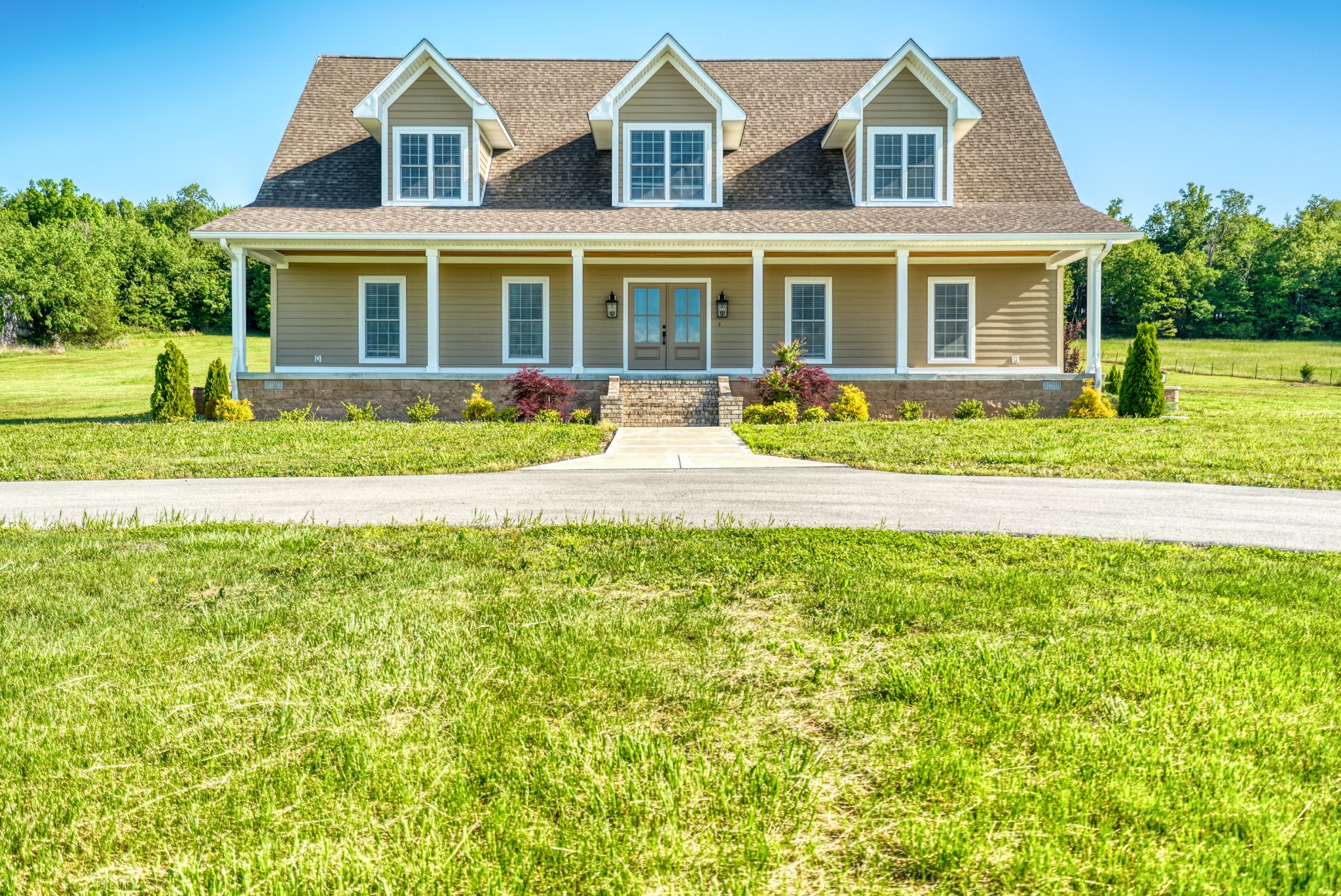 315 Blue And Gray Park Road Elkton, KY 42220 - Photo 1 of 66 a front view of a house with a yard