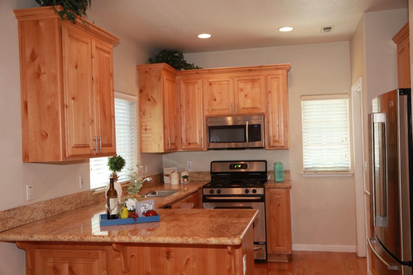 2381 Homestead Road Santa Clara, CA 95050 - Photo 11 of 20 a kitchen with a appliances a sink and cabinets