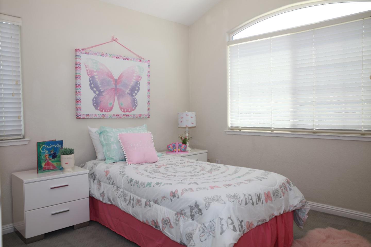 2381 Homestead Road Santa Clara, CA 95050 - Photo 17 of 20 a bedroom with a bed and a window