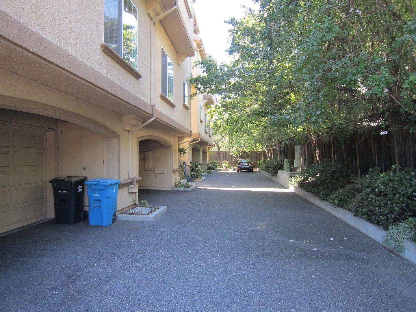 2381 Homestead Road Santa Clara, CA 95050 - Photo 20 of 20 a view of a house with backyard and a tree