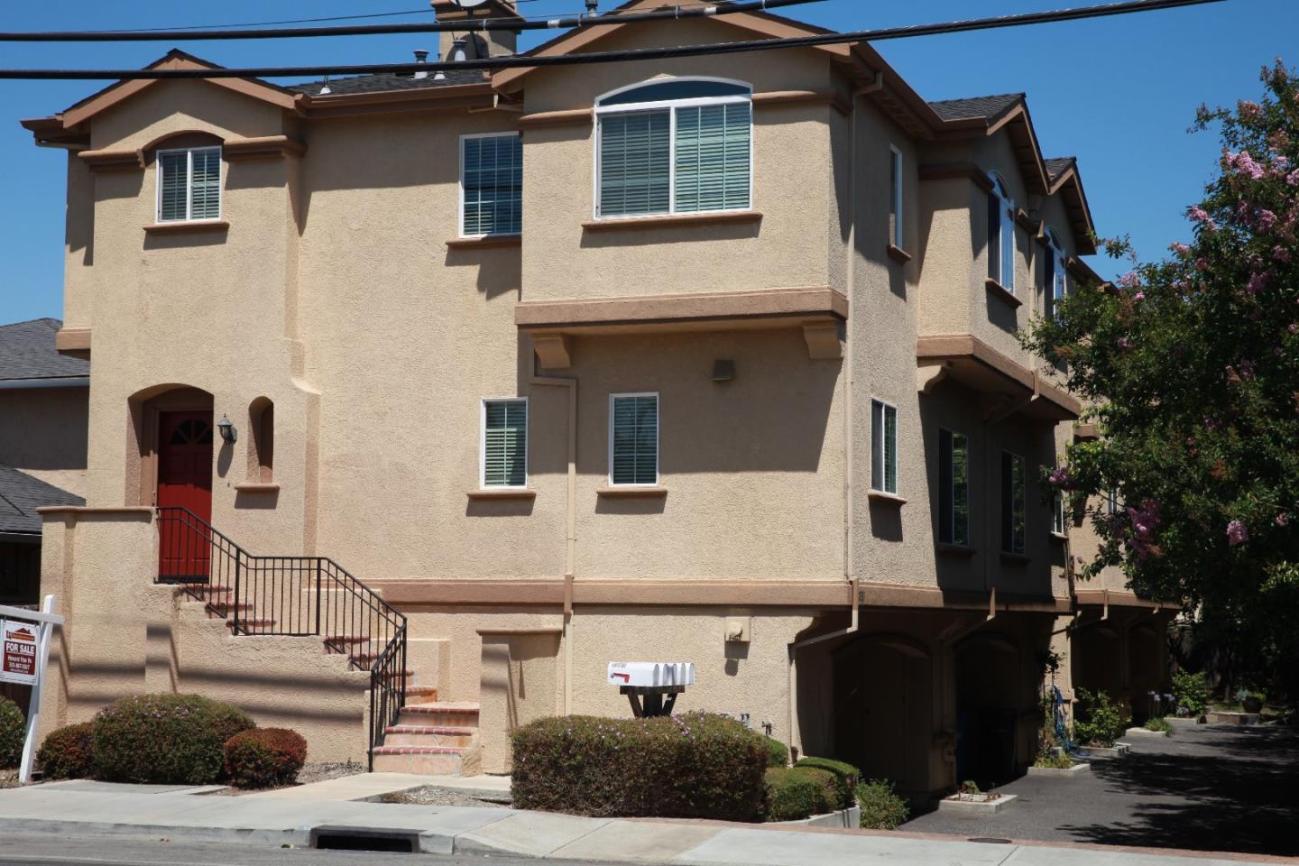 2381 Homestead Road Santa Clara, CA 95050 - Photo 2 of 20 a front view of a house with parking
