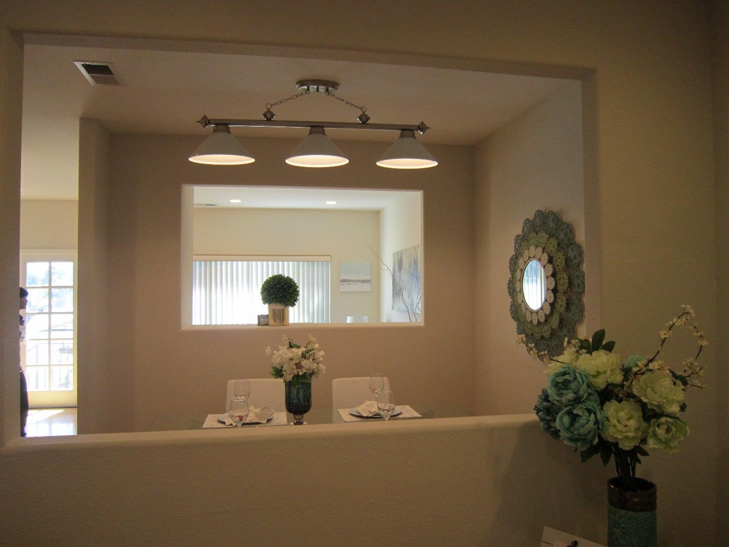 2381 Homestead Road Santa Clara, CA 95050 - Photo 7 of 20 a bathroom with a sink a vanity and a mirror