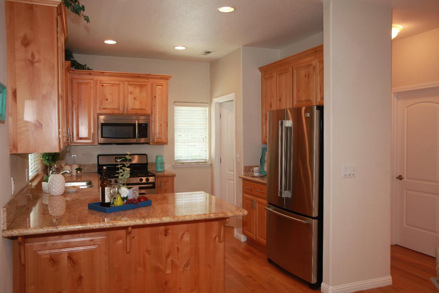 2381 Homestead Road Santa Clara, CA 95050 - Photo 9 of 20 a kitchen with stainless steel appliances a refrigerator and a sink