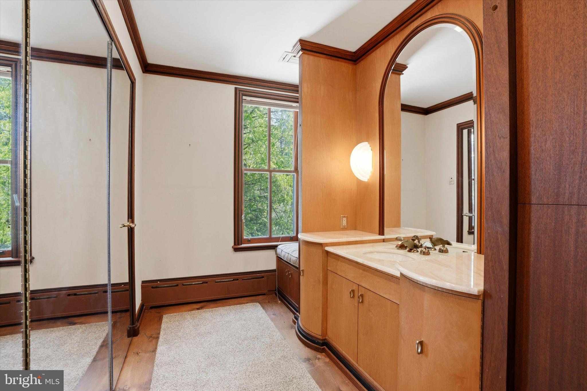 1451 Prizer Road Pottstown, PA 19465 - Photo 16 of 23 a bathroom with a granite countertop sink and a mirror