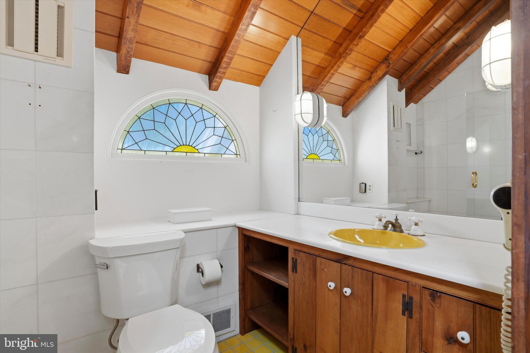 1451 Prizer Road Pottstown, PA 19465 - Photo 21 of 23 a bathroom with a sink a mirror and a toilet