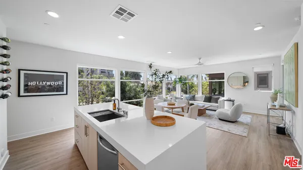 a view of kitchen dining table and chairs