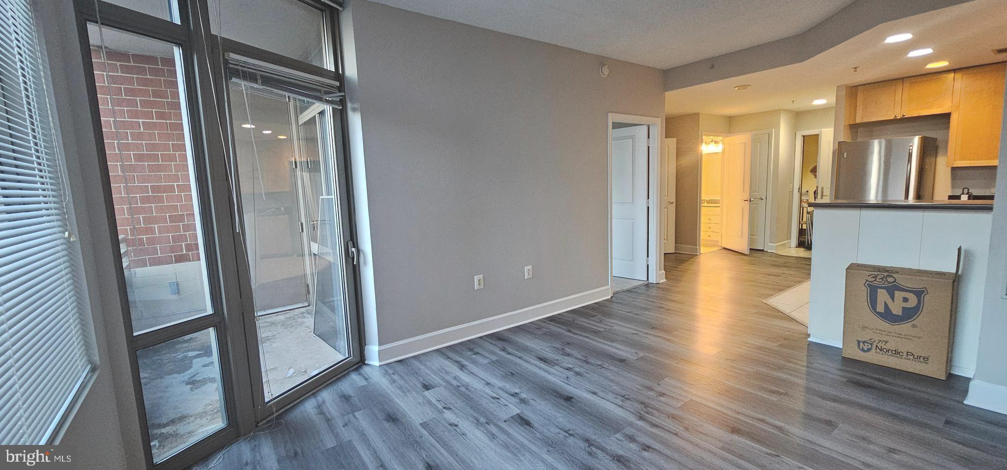 3600 South Glebe Road, Unit 330W Arlington, VA 22202 - Photo 12 of 34 a view of a hallway with wooden floor and staircase