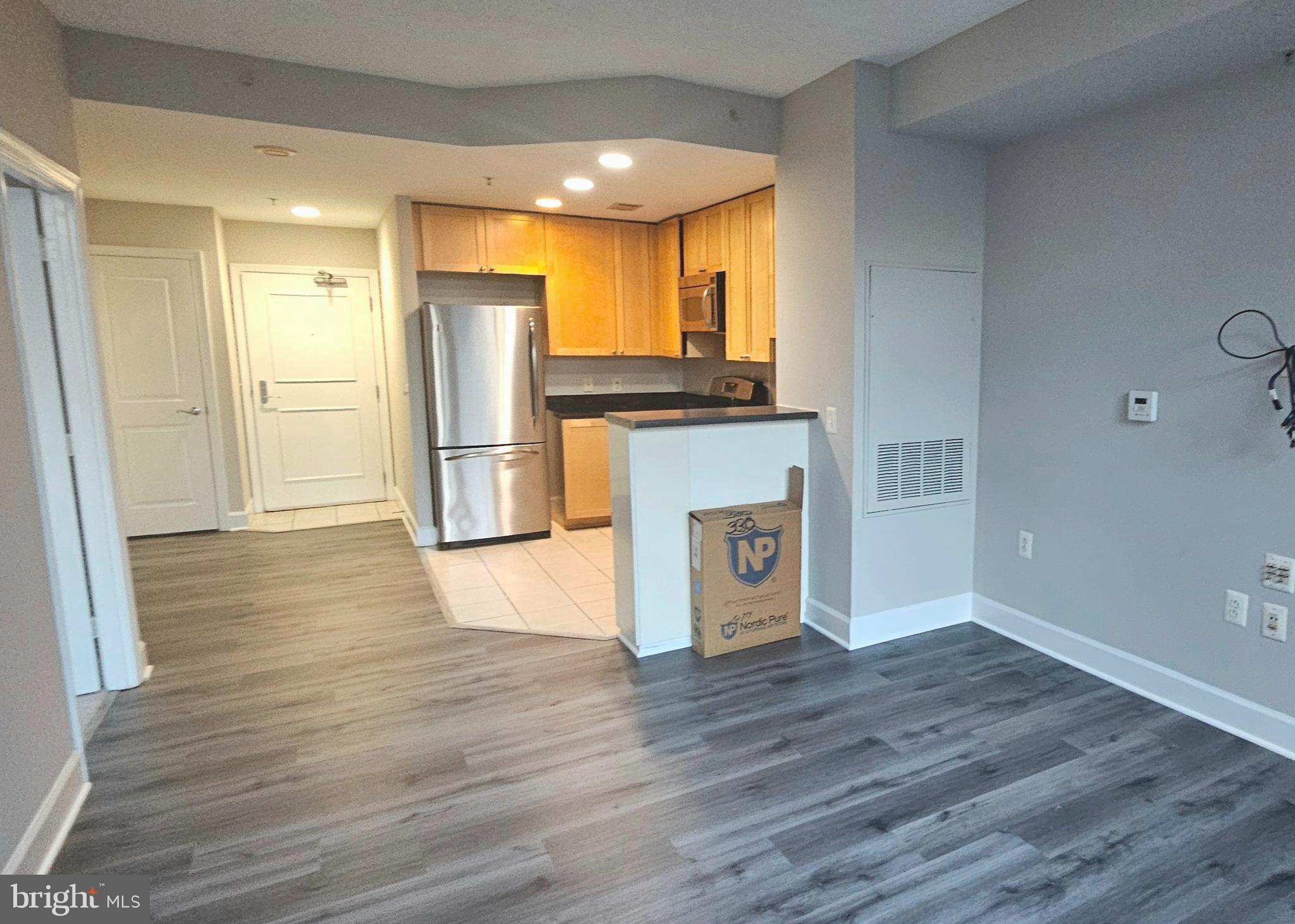 3600 South Glebe Road, Unit 330W Arlington, VA 22202 - Photo 14 of 34 a view of kitchen with stainless steel appliances granite countertop a refrigerator and a stove
