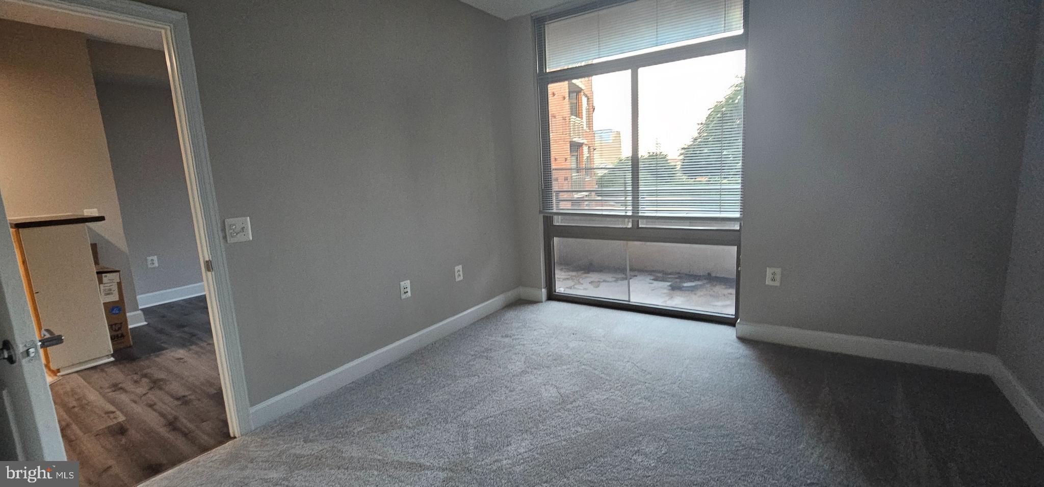 3600 South Glebe Road, Unit 330W Arlington, VA 22202 - Photo 16 of 34 a view of workspace and bedroom with windows