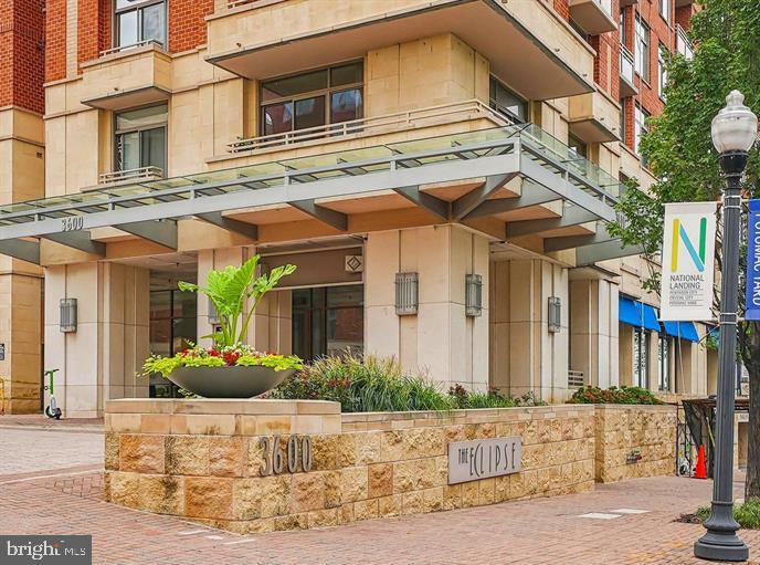 3600 South Glebe Road, Unit 330W Arlington, VA 22202 - Photo 4 of 34 a view of a house with a cars park side of the road