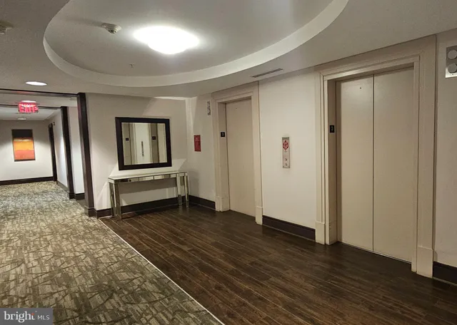 a kitchen with stainless steel appliances a refrigerator and a stove top oven