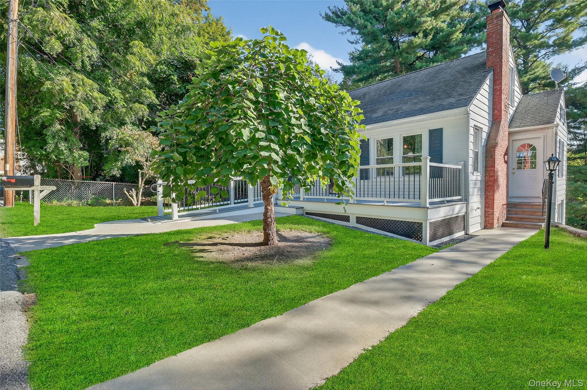 34 Mountainview Road Poughkeepsie, NY 12603 - Photo 4 of 28 a view of a house with a backyard