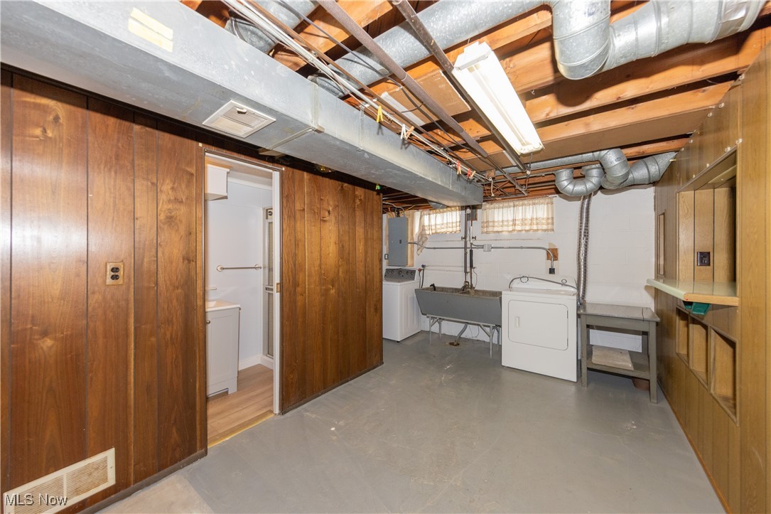 29103 Barjode Road Eastlake, OH 44095 - Photo 24 of 31 Below grade area with electric panel and wooden walls