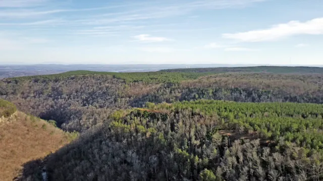 a view of an ocean and mountain
