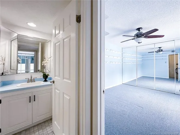 a view of a kitchen with a sink and cabinet area