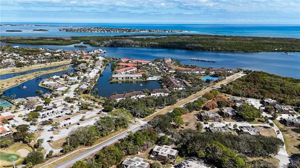 a view of a city with ocean view