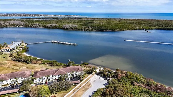 a view of a balcony with an outdoor space and seating area