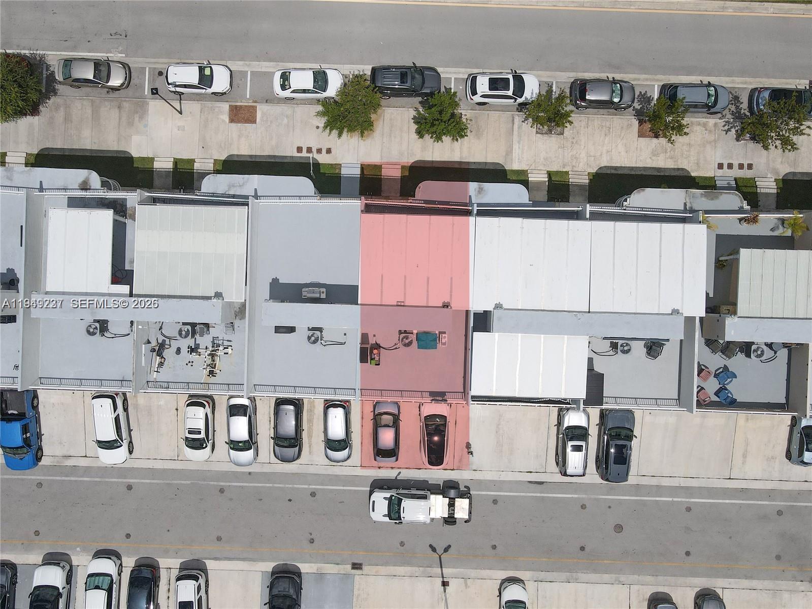 25874 Southwest 139th Path, Unit 25874 Homestead, FL 33032 - Photo 7 of 7 an aerial view of residential houses with outdoor space