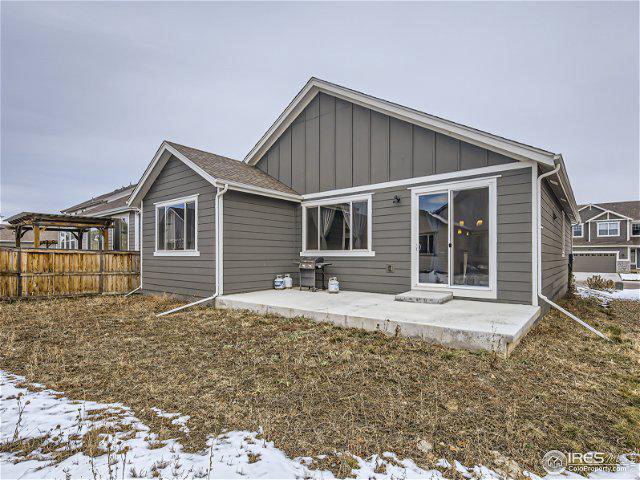 555 Ranchhand Drive Berthoud, CO 80513 - Photo 10 of 11 a house with trees in the background