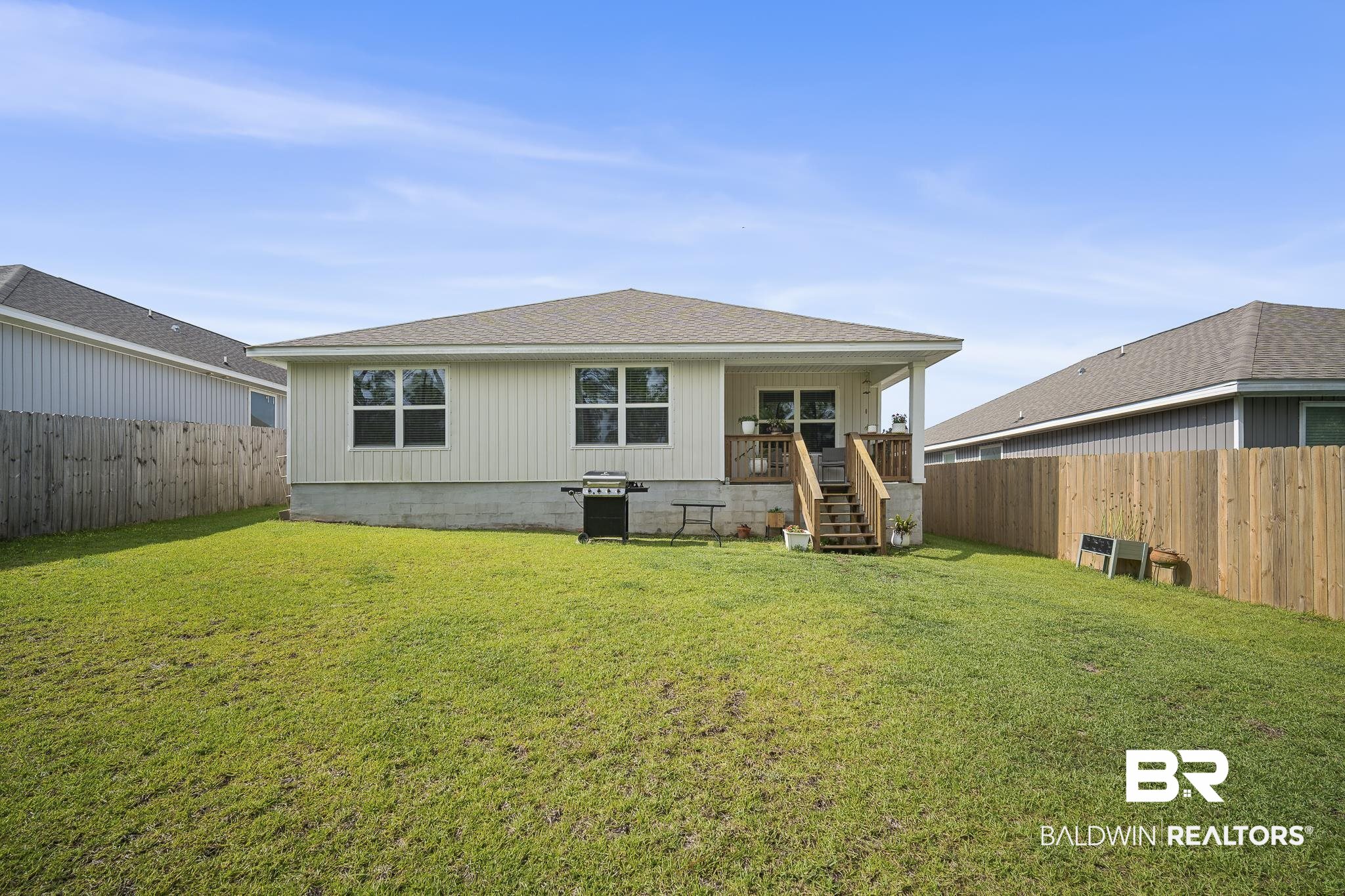 10232 Brodick Loop Spanish Fort, AL 36527 - Photo 24 of 29 Rear view of house featuring stairway and a shingled roof