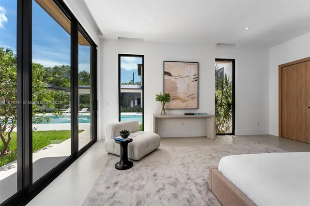 a white toilet sitting next to a shower curtain