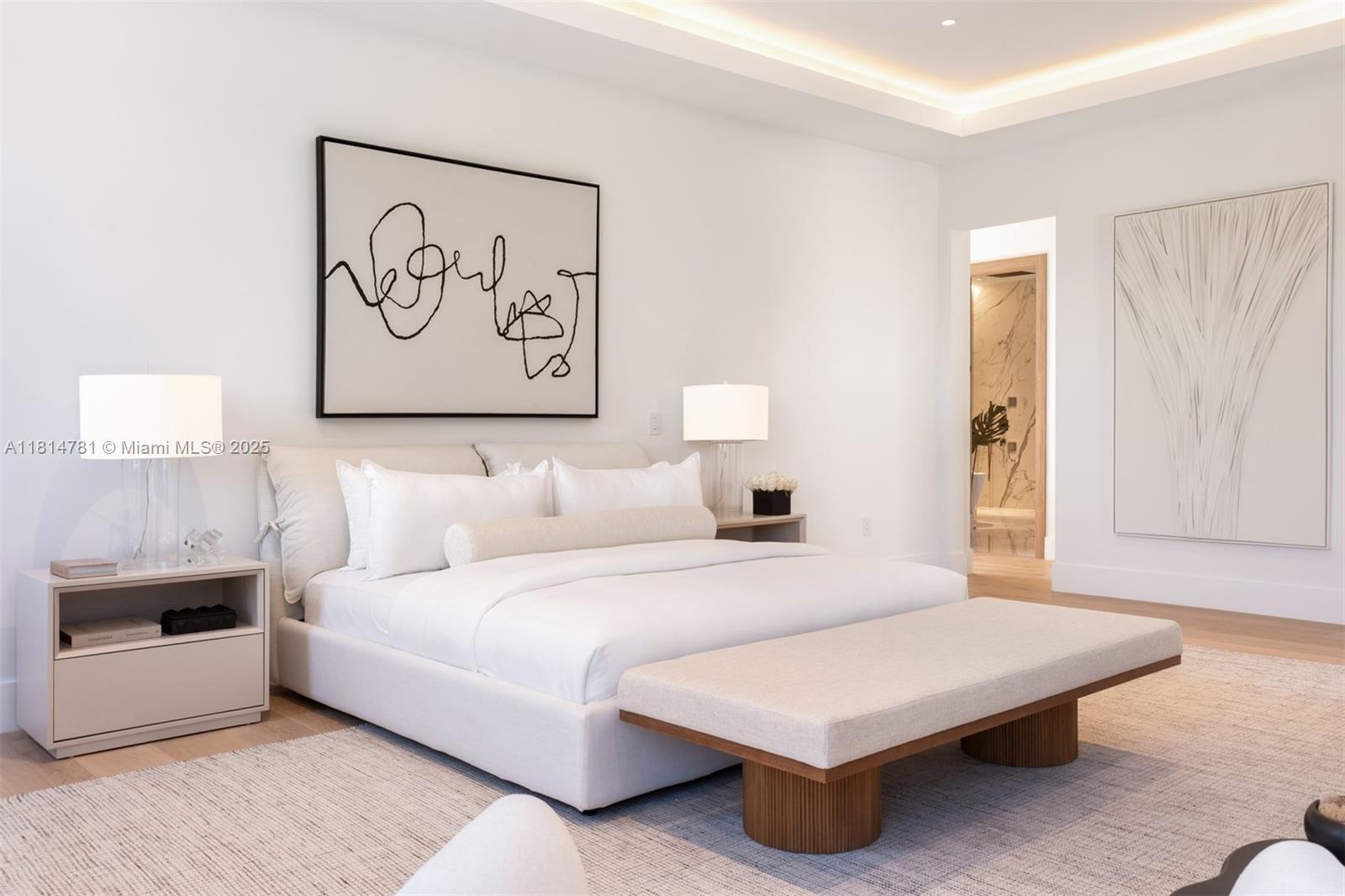 6730 Southwest 115th Street Pinecrest, FL 33156 - Photo 37 of 77 a bedroom with a bed and a couch