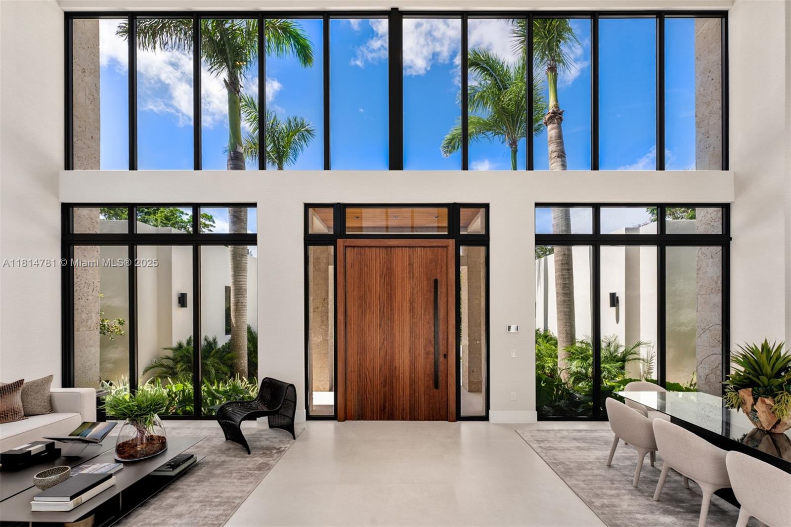 6730 Southwest 115th Street Pinecrest, FL 33156 - Photo 10 of 77 a house view with a garden space