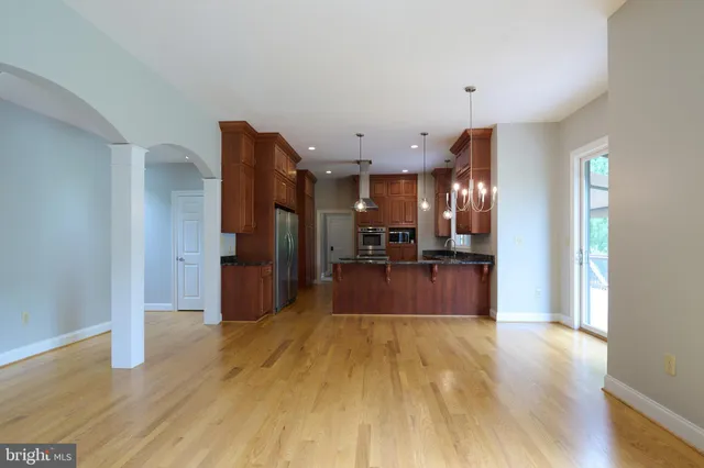 a bathroom with a double vanity sink and mirror