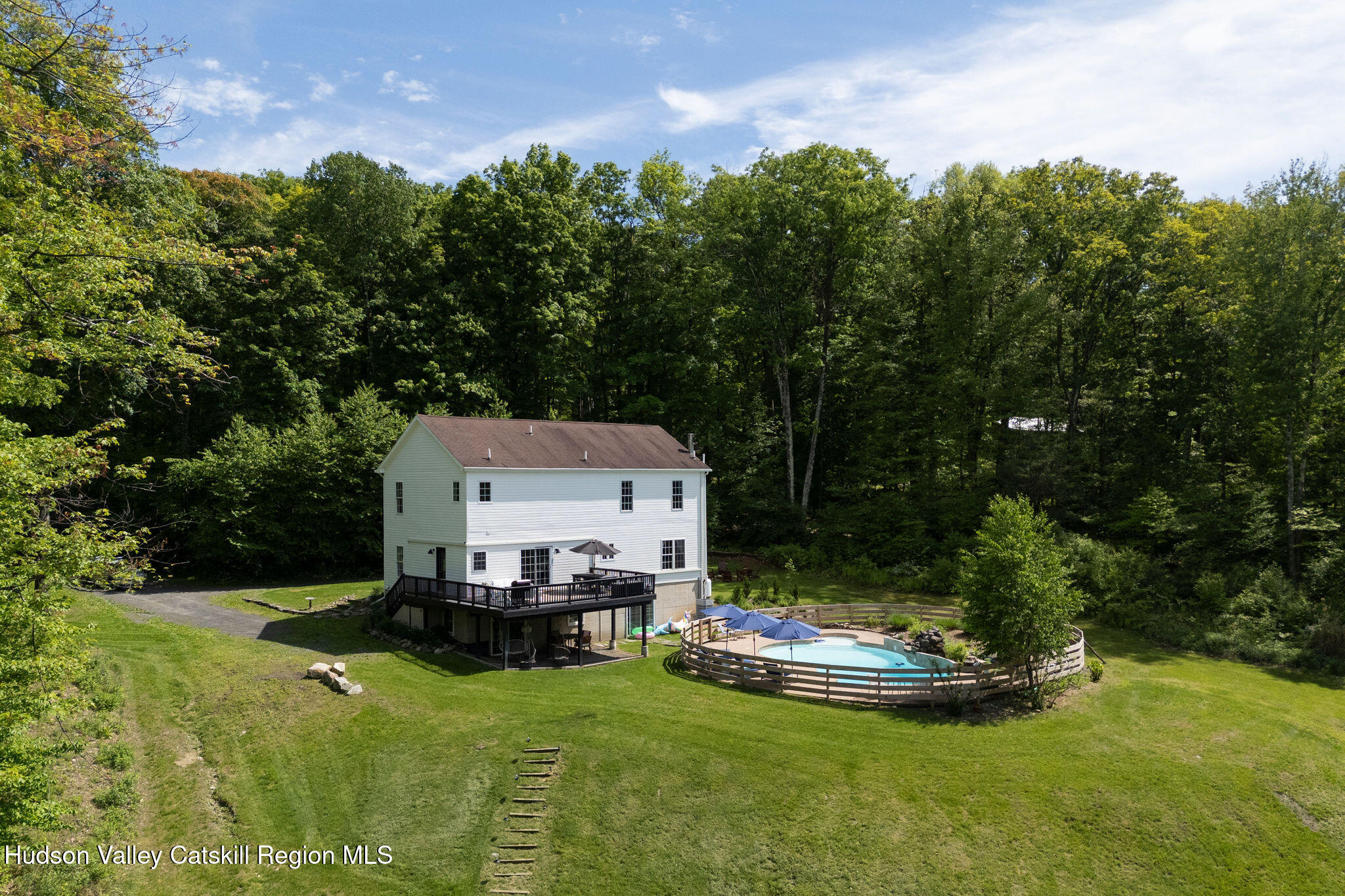 31 Laurel Hollow Road Kerhonkson, NY 12446 - Photo 33 of 47 a view of a house with swimming pool and a yard