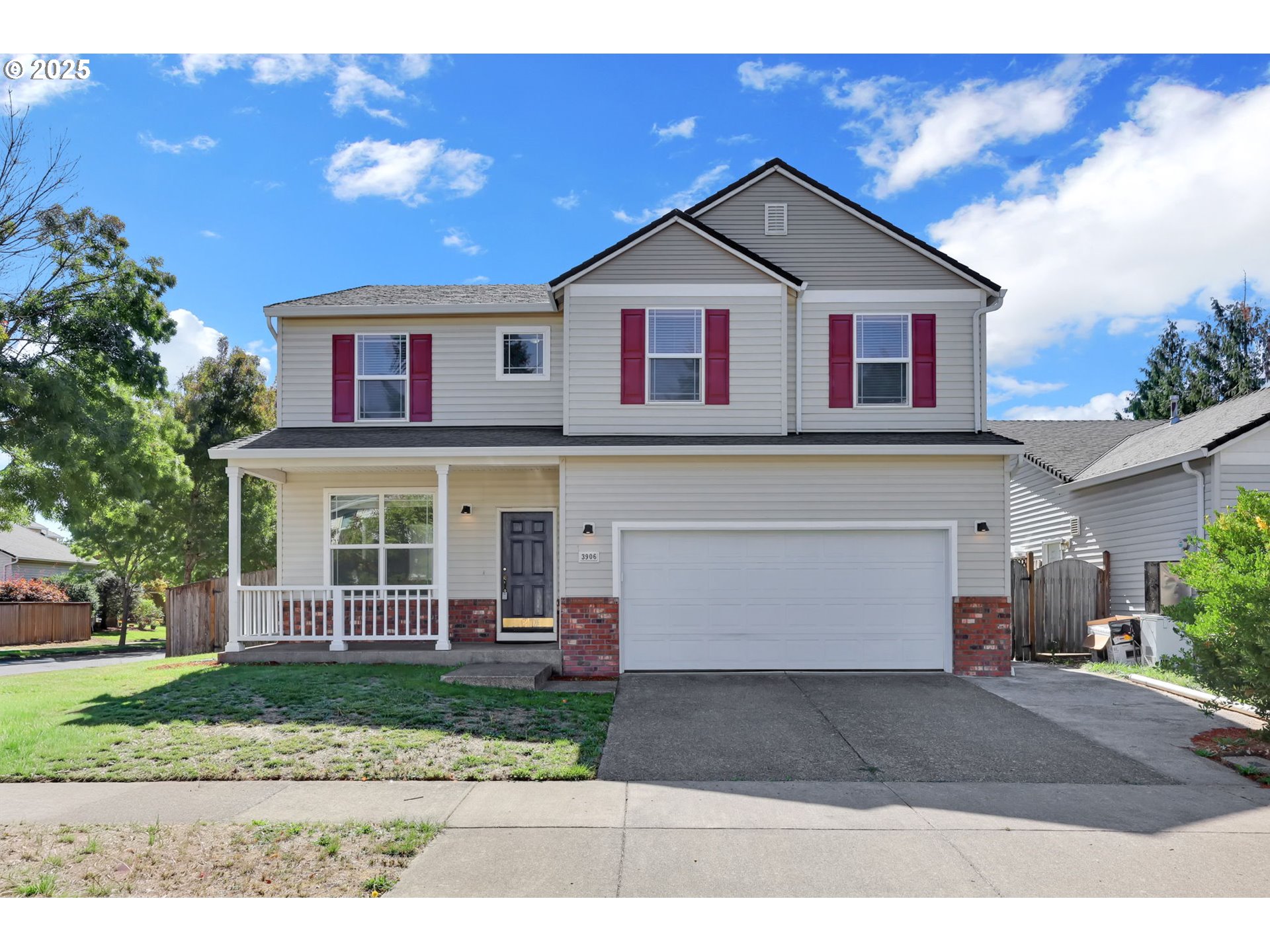 3906 Century Drive Eugene, OR 97402 - Photo 1 of 33 a front view of a house with a yard and garage