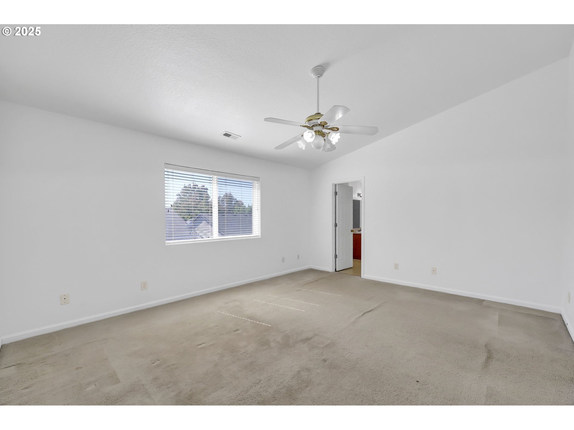 3906 Century Drive Eugene, OR 97402 - Photo 17 of 33 a view of an empty room with a window