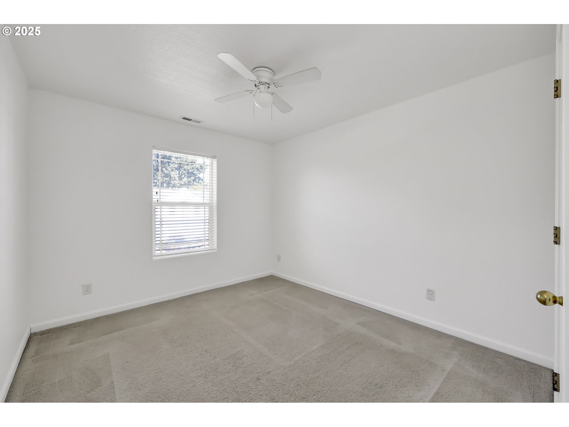 3906 Century Drive Eugene, OR 97402 - Photo 20 of 33 a view of an empty room with a window