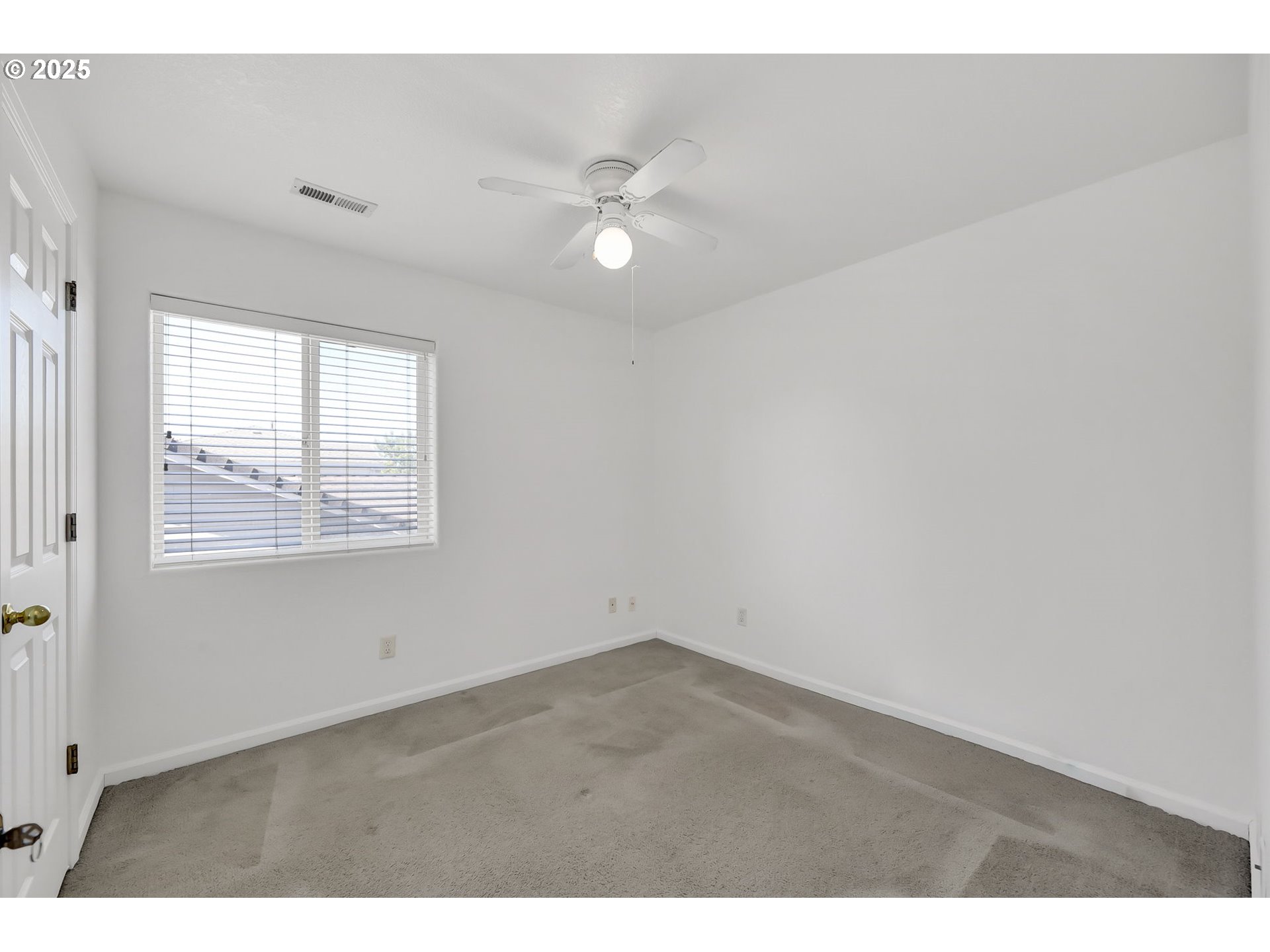 3906 Century Drive Eugene, OR 97402 - Photo 23 of 33 a view of an empty room with a window