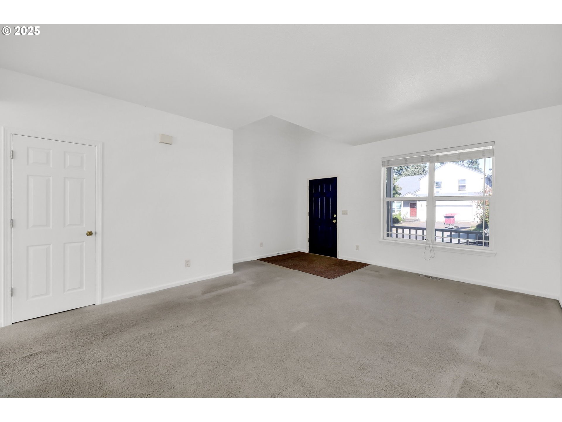 3906 Century Drive Eugene, OR 97402 - Photo 4 of 33 a view of an empty room and window