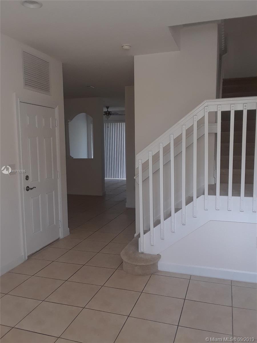 3168 Northeast 11th Street Homestead, FL 33033 - Photo 20 of 24 Living Room/Garage Door