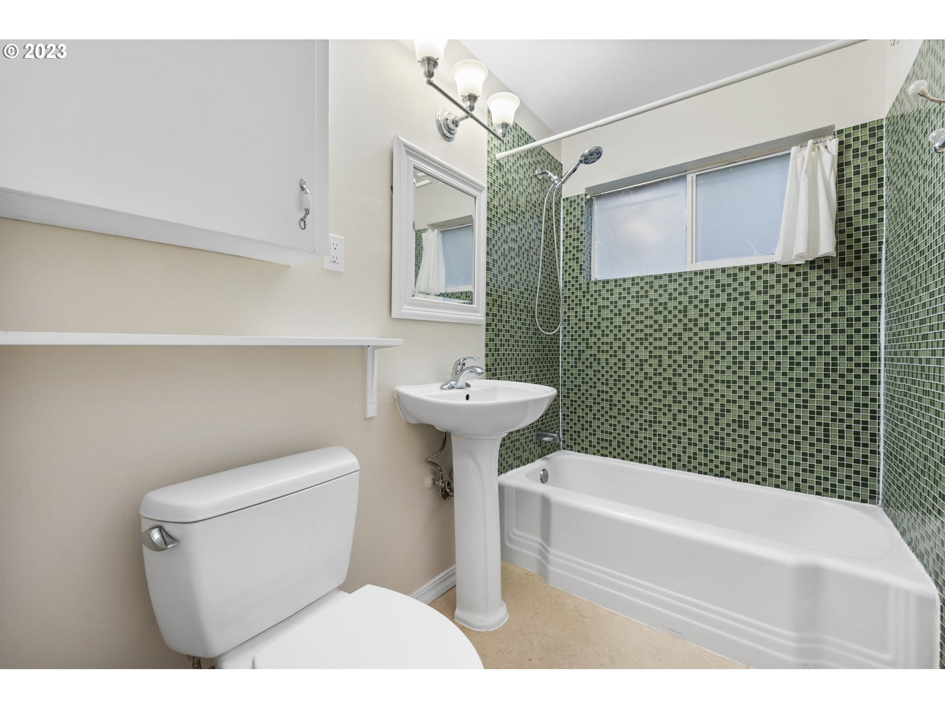 8400 Southwest Canyon Lane, Unit 6 Portland, OR 97225 - Photo 14 of 19 a bathroom with a sink a toilet and shower