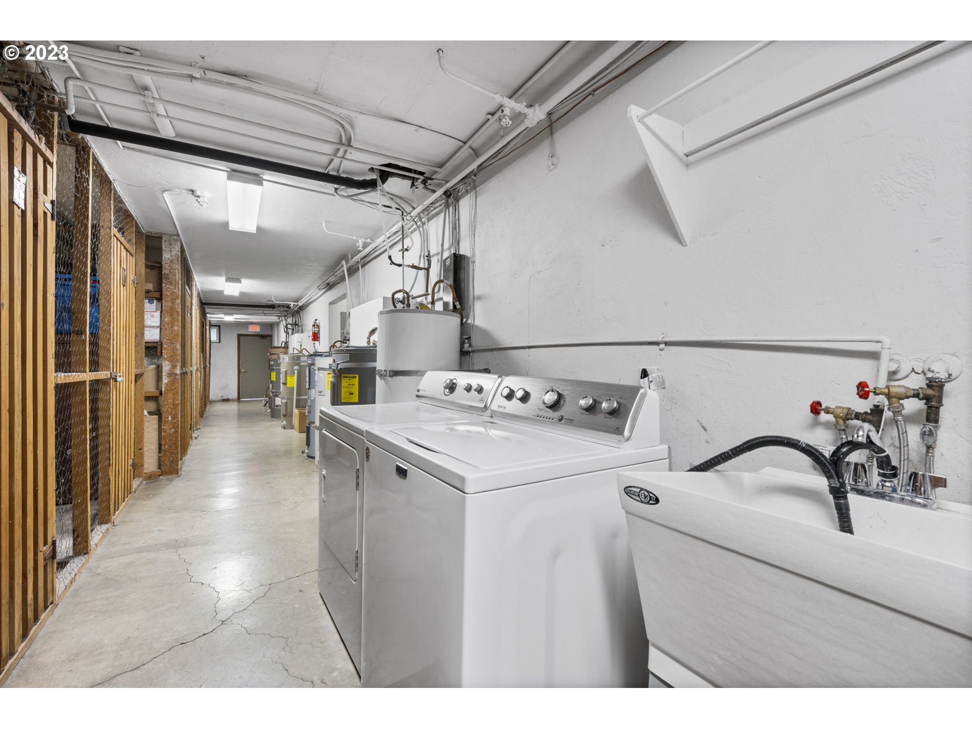 8400 Southwest Canyon Lane, Unit 6 Portland, OR 97225 - Photo 16 of 19 a utility room with dryer and washer