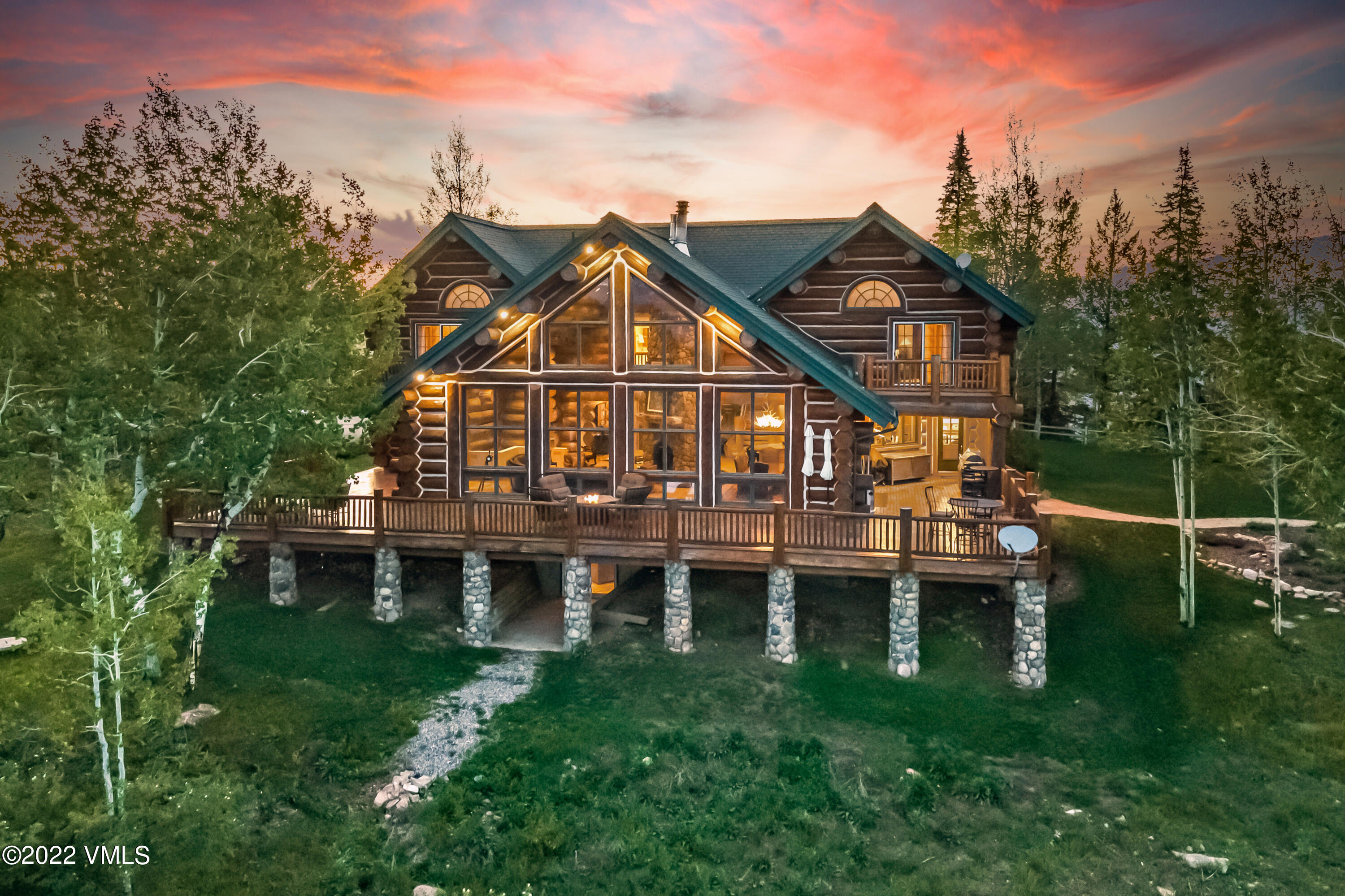 4000 Bellyache Ridge Road Wolcott, CO 81655 - Photo 1 of 56 a front view of a house with a garden
