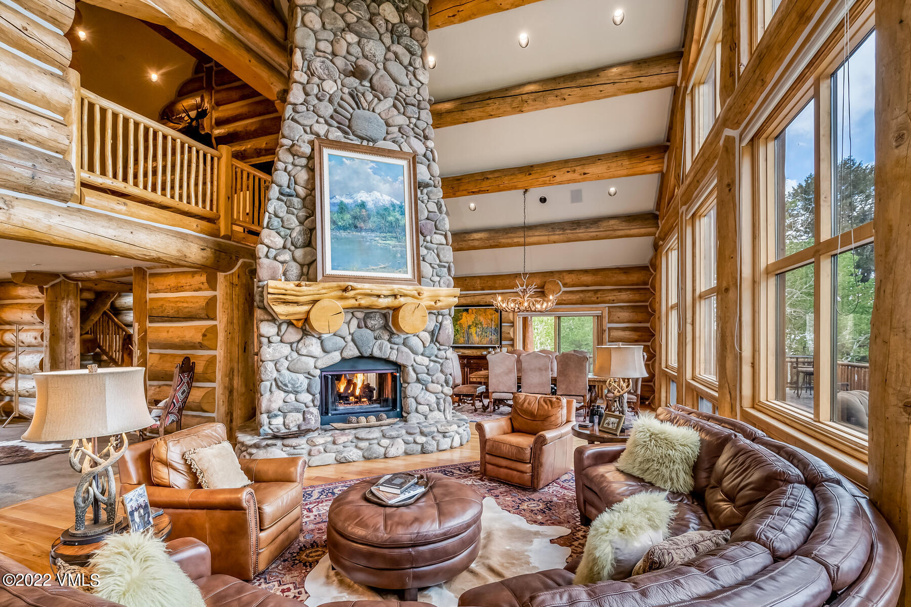4000 Bellyache Ridge Road Wolcott, CO 81655 - Photo 12 of 56 a living room with fireplace furniture and a large window