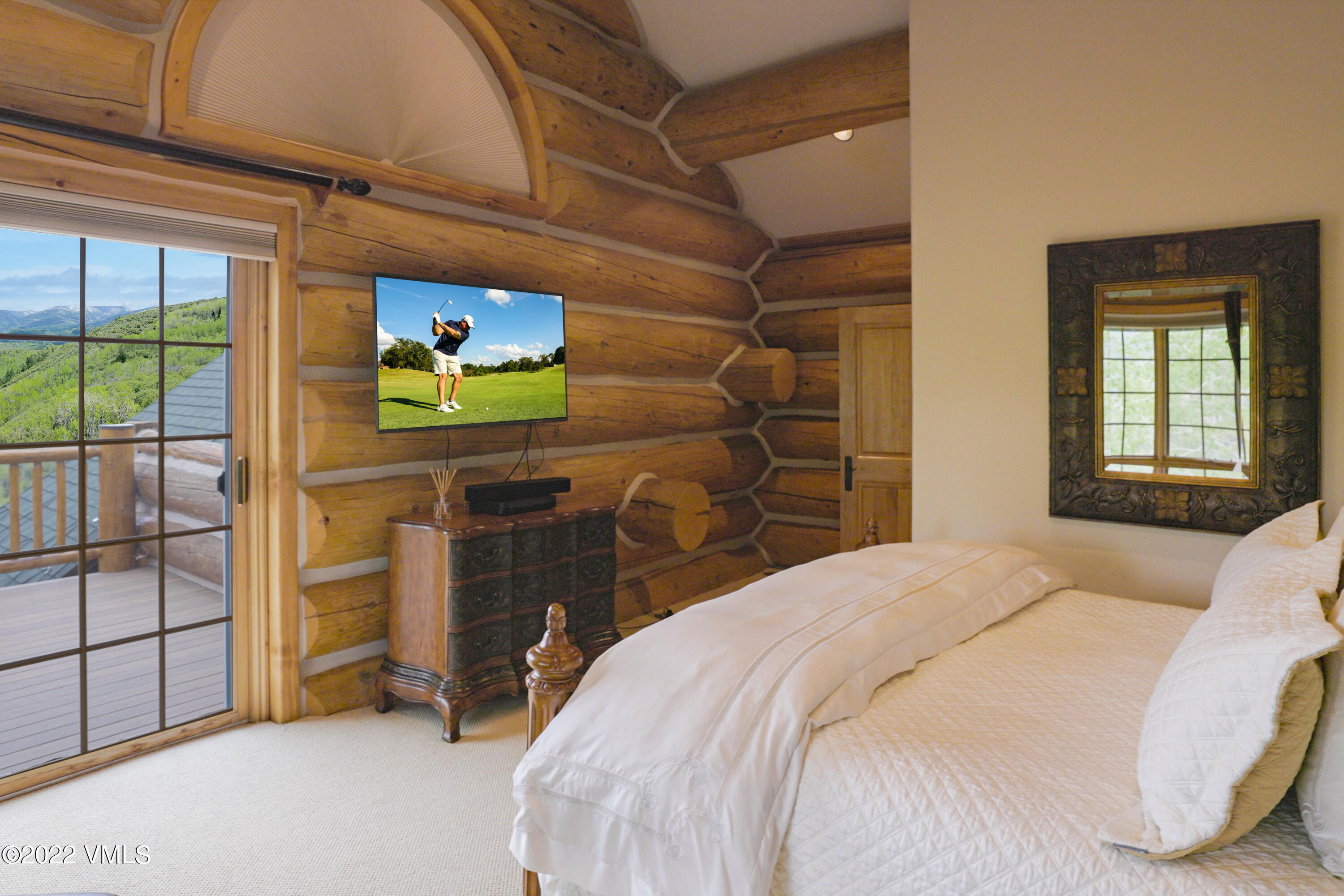 4000 Bellyache Ridge Road Wolcott, CO 81655 - Photo 22 of 56 a bedroom with a bed and a flat tv screen