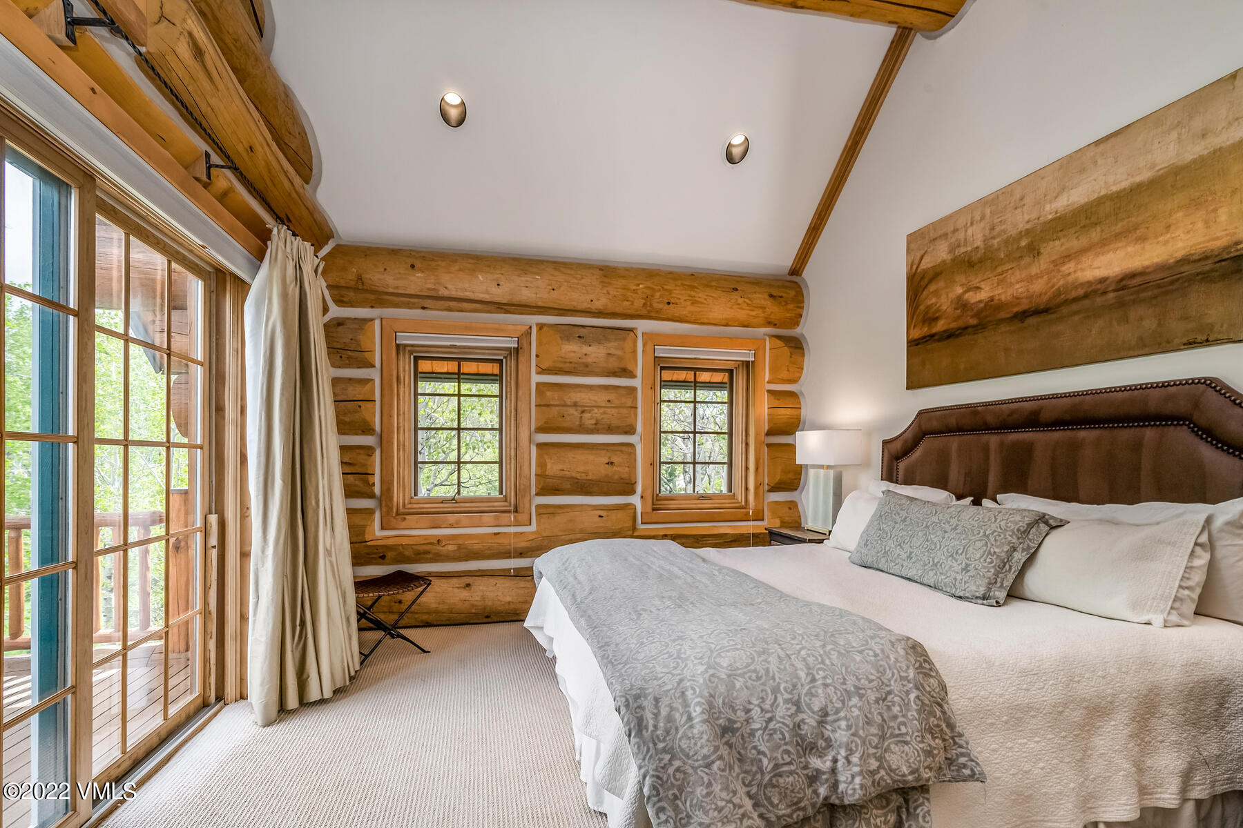 4000 Bellyache Ridge Road Wolcott, CO 81655 - Photo 24 of 56 a bedroom with a bed and a large window