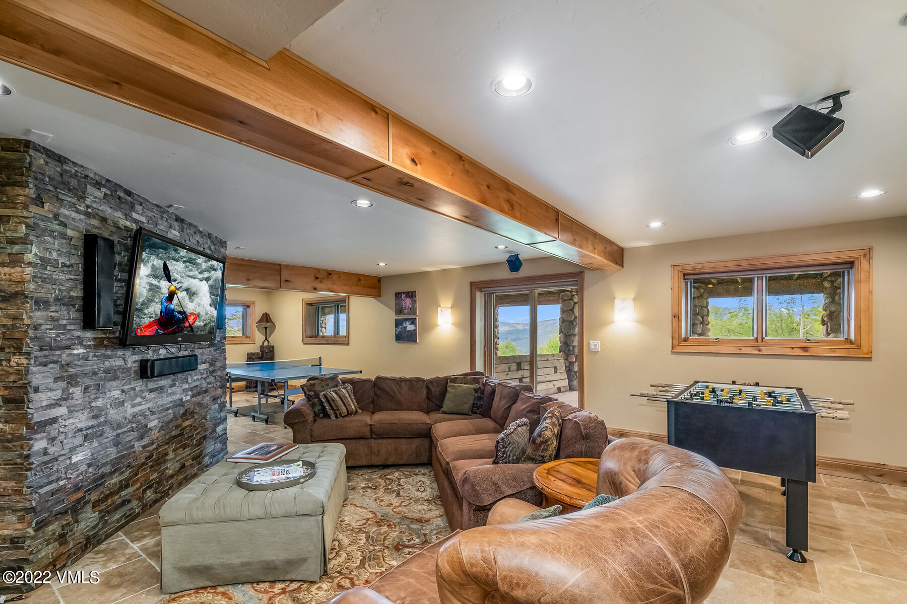 4000 Bellyache Ridge Road Wolcott, CO 81655 - Photo 33 of 56 a living room with furniture and a flat screen tv