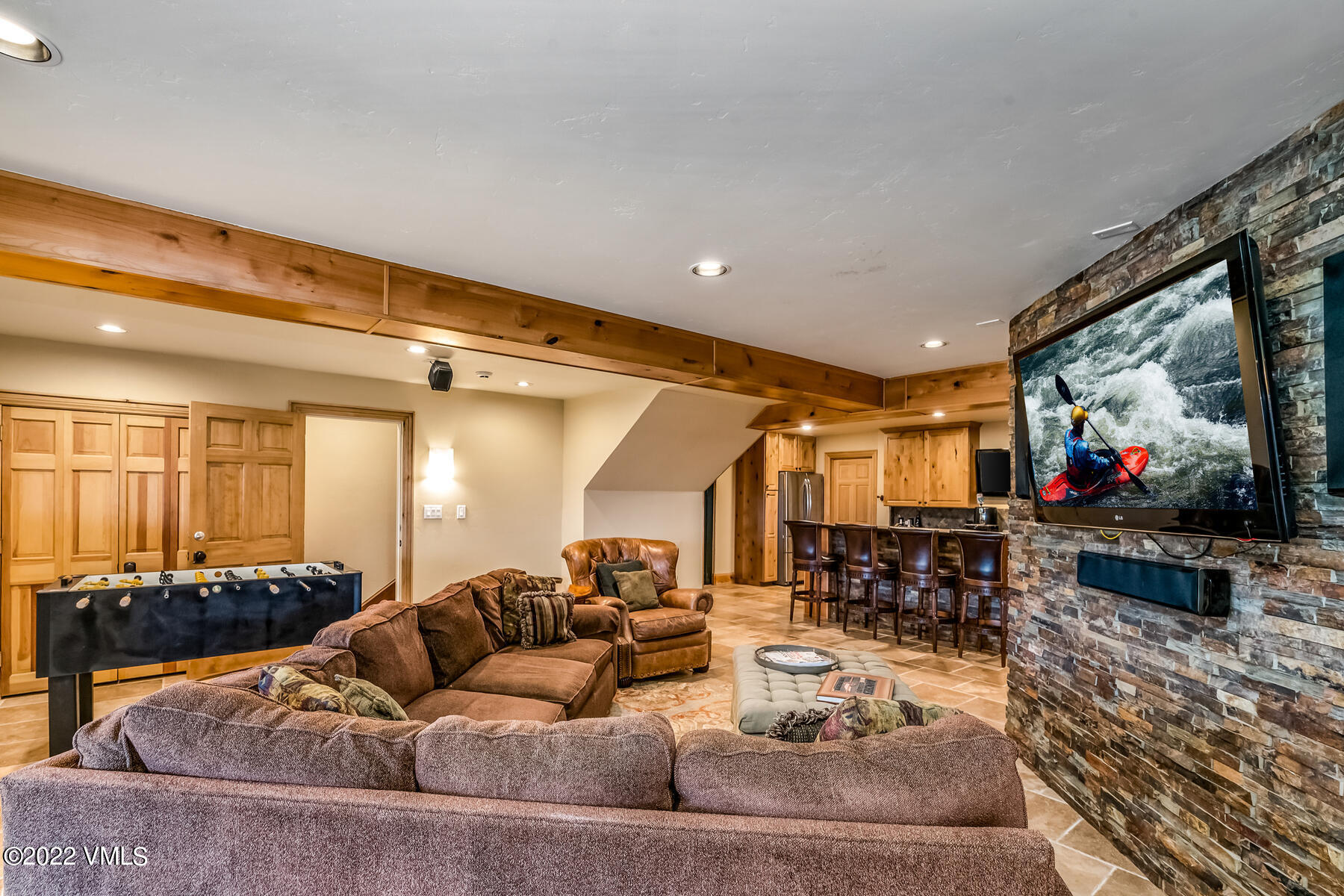 4000 Bellyache Ridge Road Wolcott, CO 81655 - Photo 34 of 56 a living room with furniture and a flat screen tv