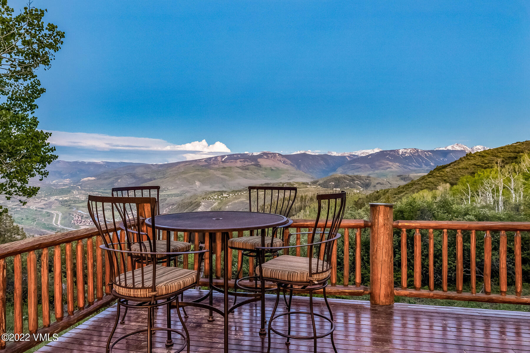 4000 Bellyache Ridge Road Wolcott, CO 81655 - Photo 43 of 56 a view of a balcony with chair and wooden floor