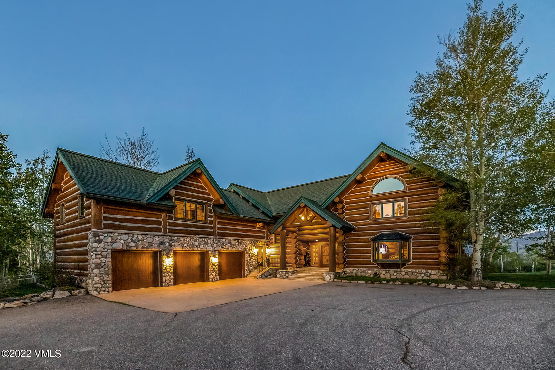 4000 Bellyache Ridge Road Wolcott, CO 81655 - Photo 6 of 56 a front view of a house with a yard and garage